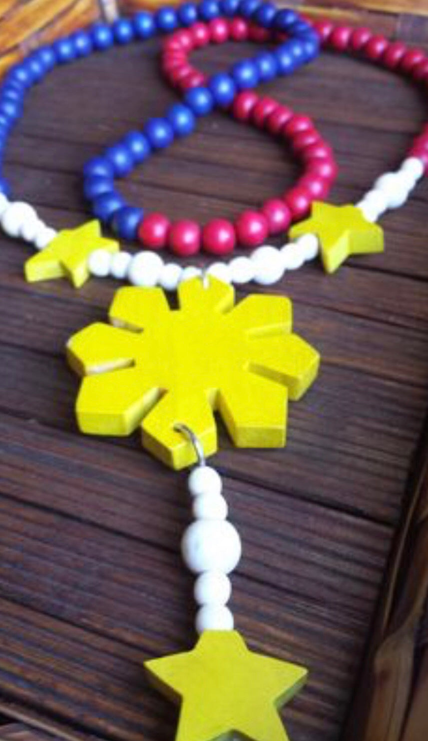 3 Stars and Sun Filipino Wood Necklace